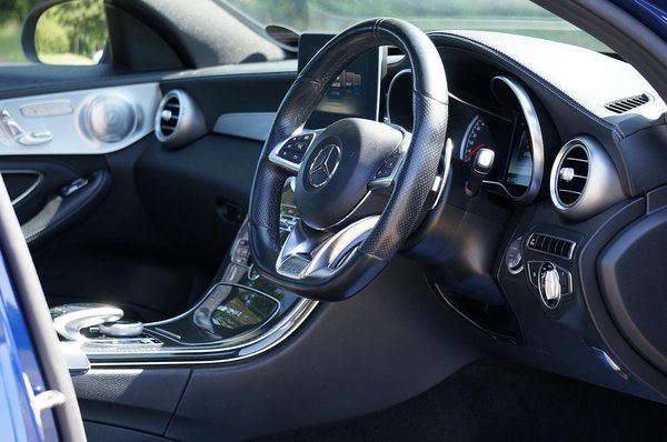 What is the best strategy for cleaning and maintaining the interior plastics of a UK vehicle?
